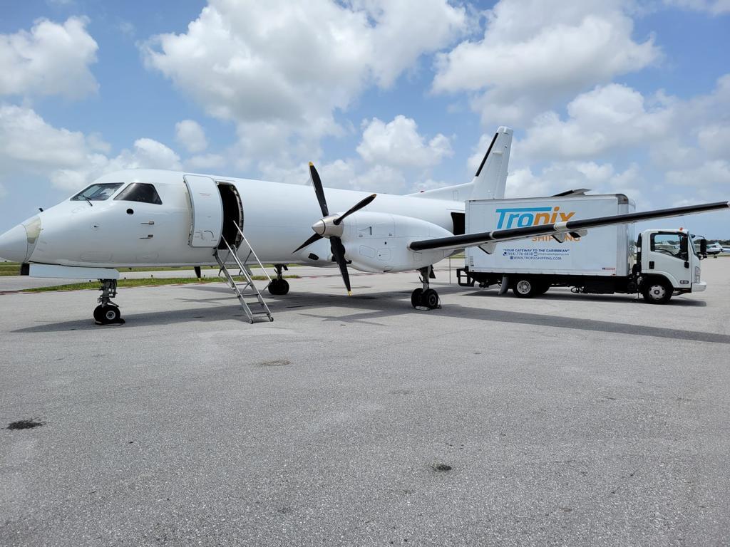 Tropix Shipping aircraft and truck
